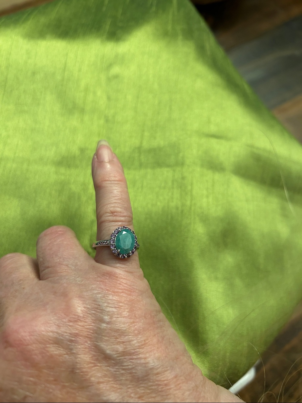 Genuine 8 mm by 10mm Emerald- Halo Ring with Genuine Amethysts
See Video - Picture 8 of 9